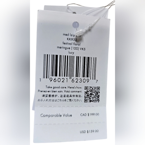 Kate Spade New York Perforated Medium L-Zip Wristlet. NEW WITH TAGS! - Picture 12 of 12